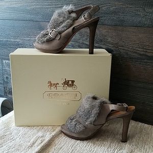Coach slingbacks embellished with fur and buckle.
